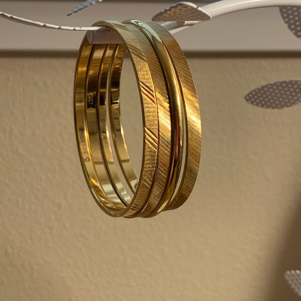 Gold bangles by Monet vintage